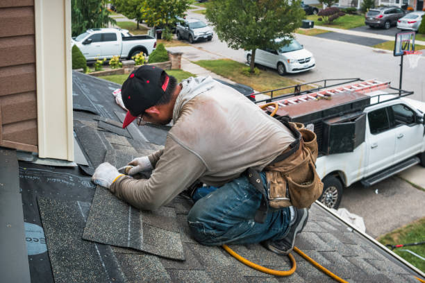 Professional Emergency Roof Repair technician working in Lochmere, NH